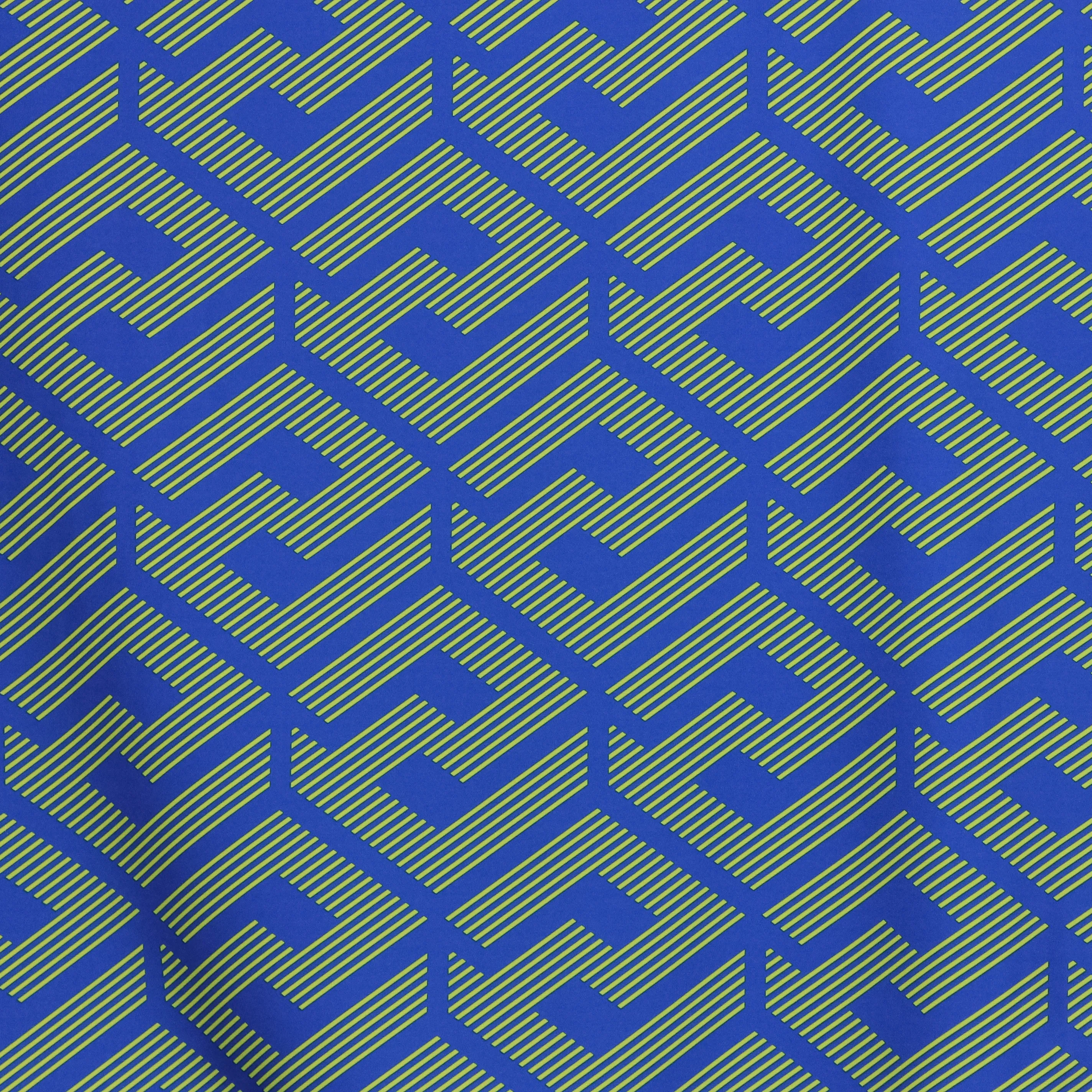 Polyester tricot abstract patroon - blauw/geel